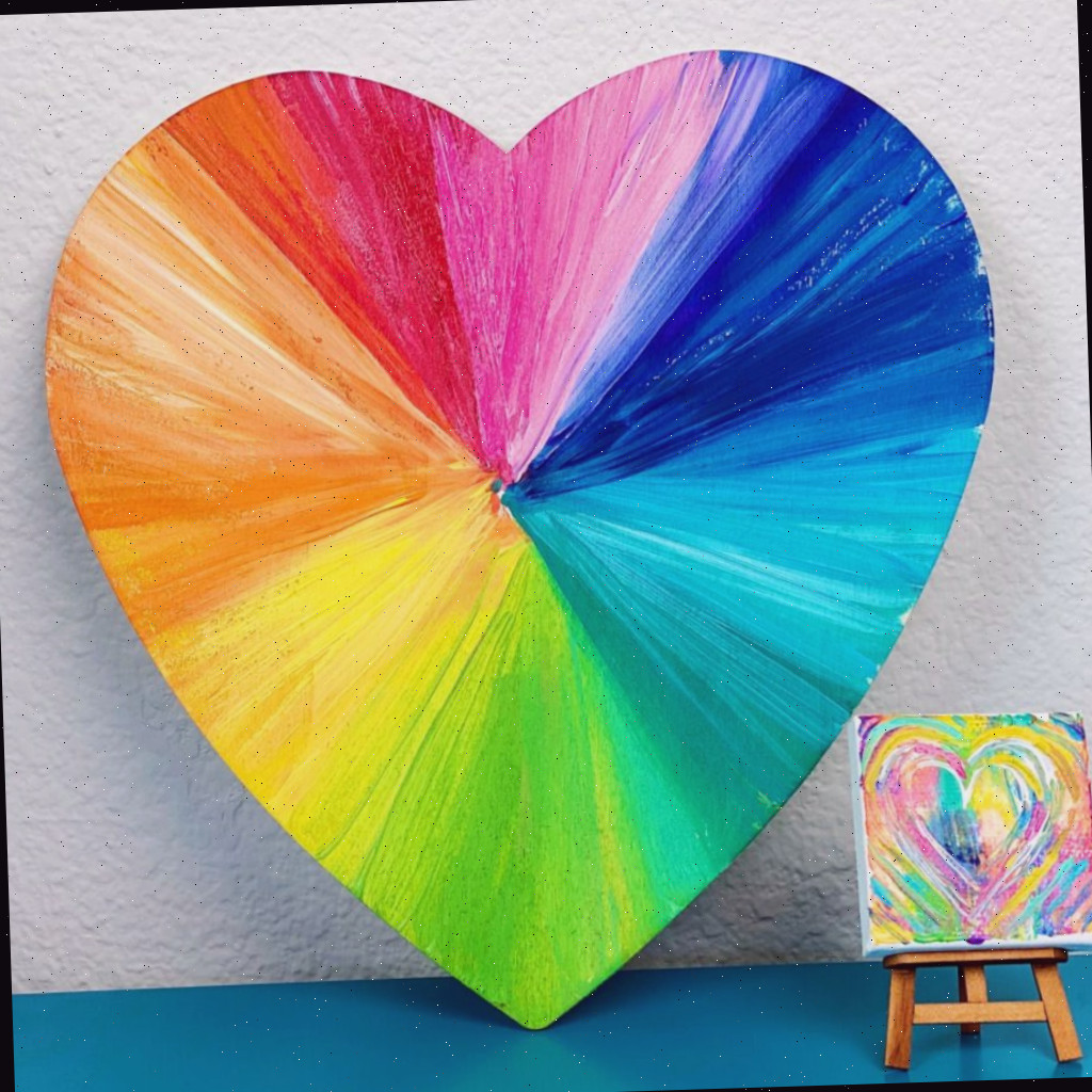 Coração pintado em arco-íris