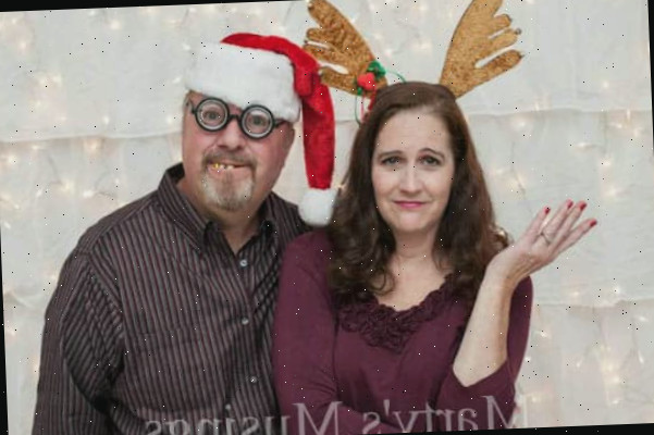 Um homem e uma mulher posando para uma foto