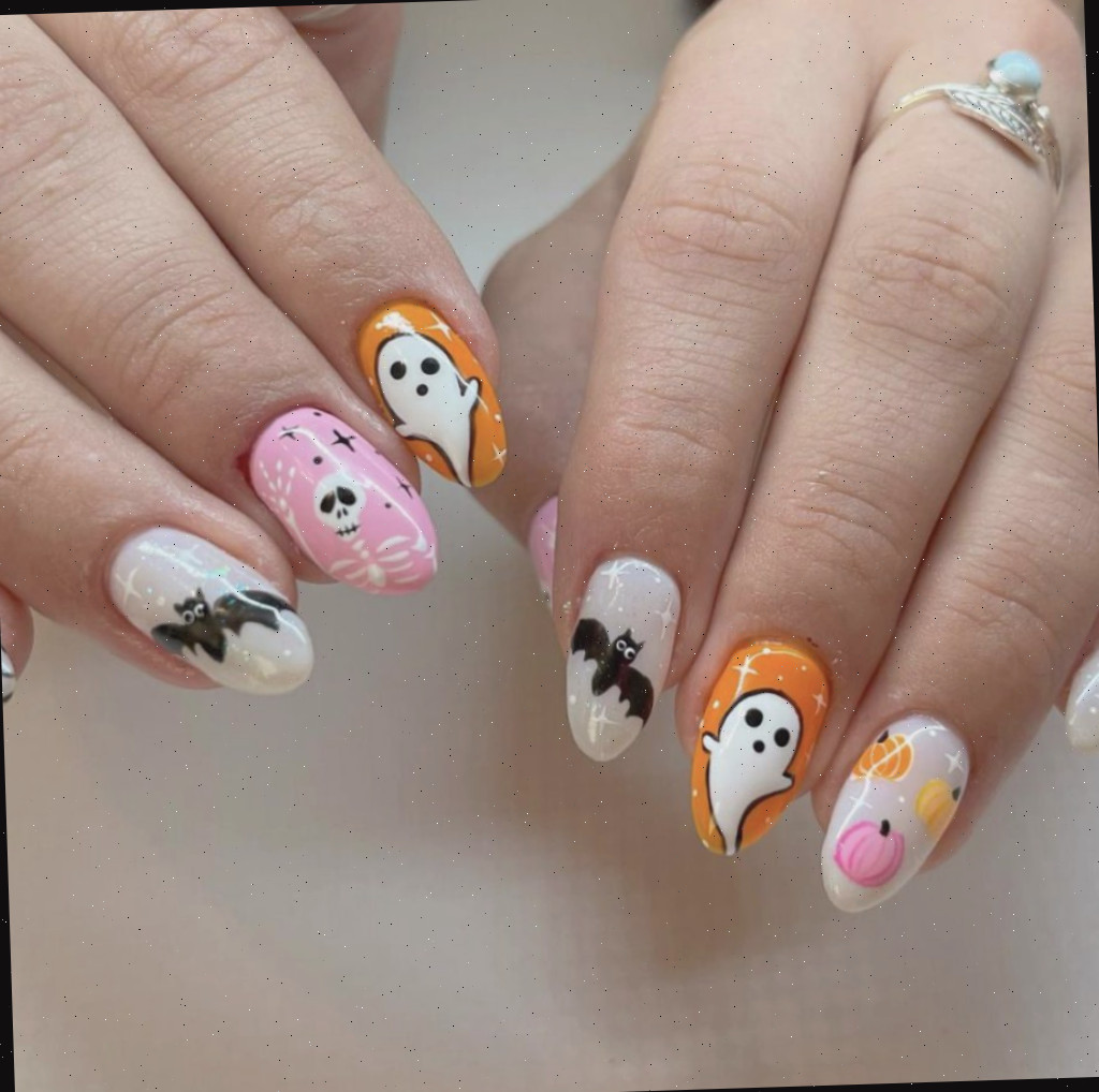 Arte de unhas com fantasmas, morcegos e esqueletos