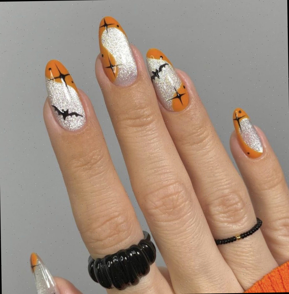 Unhas de glitter com tema de Halloween