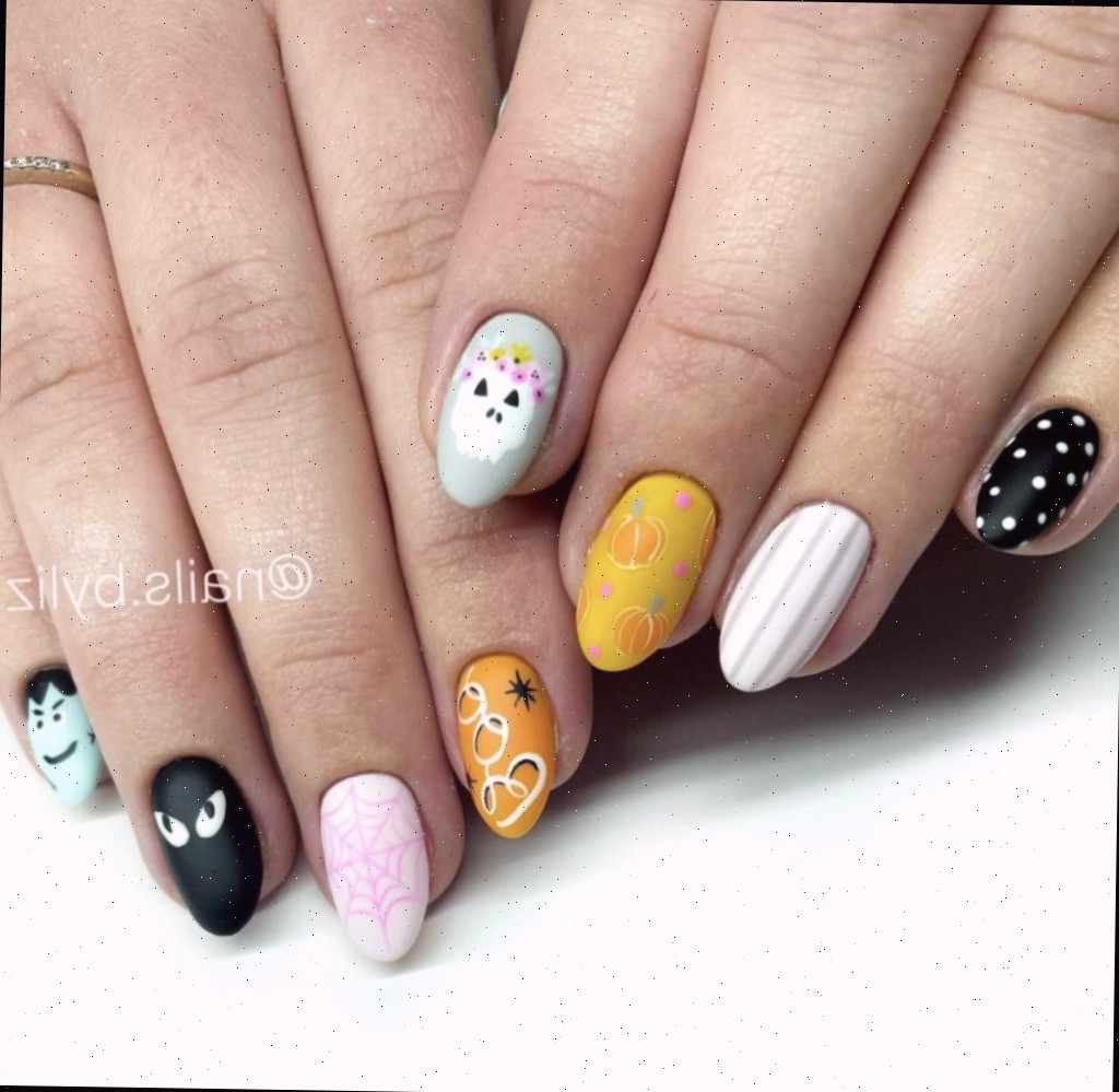 Manicure colorida de outono com designs diferentes em cada unha