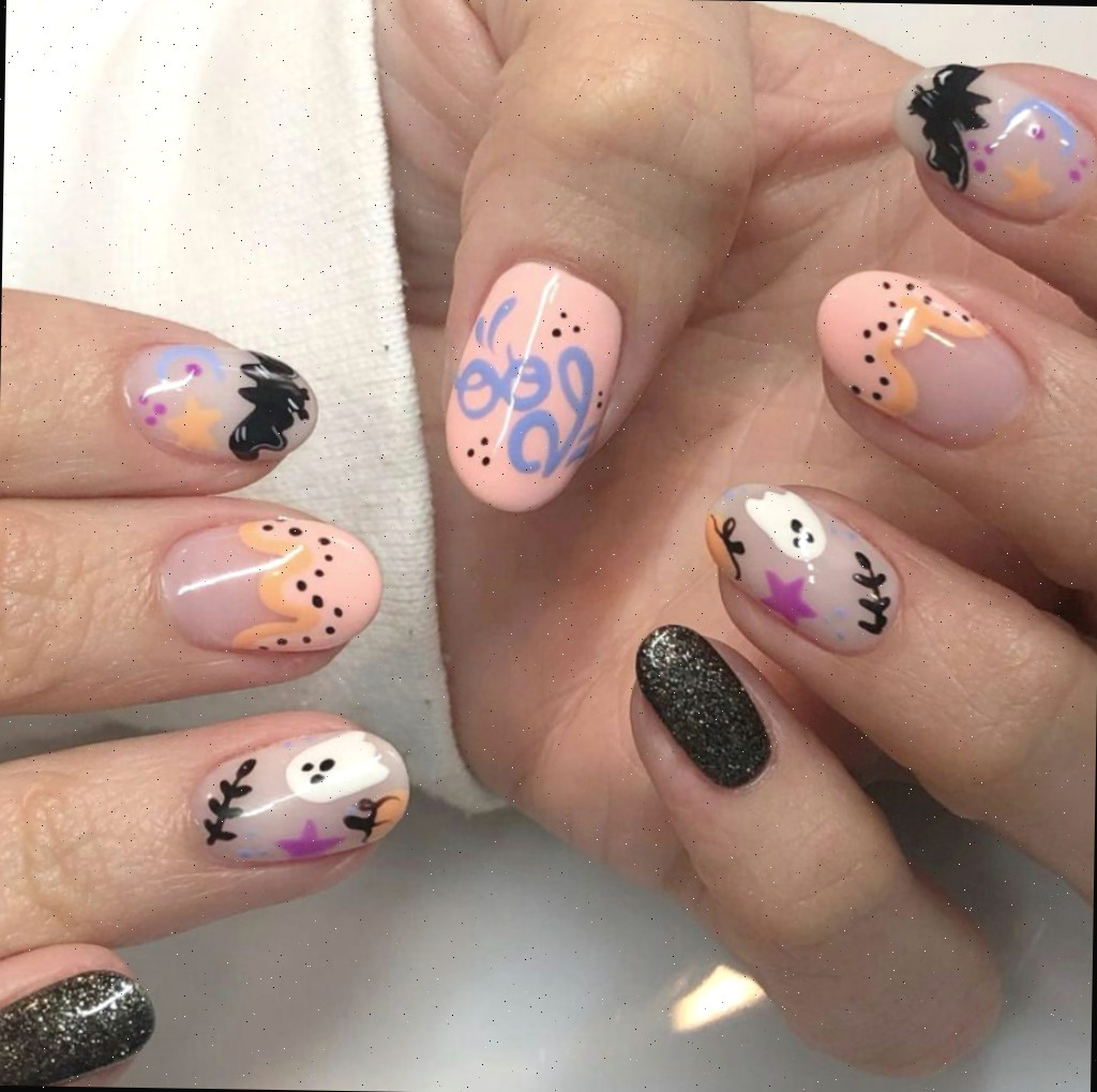 Ideia de unhas de Halloween em tons pastel
