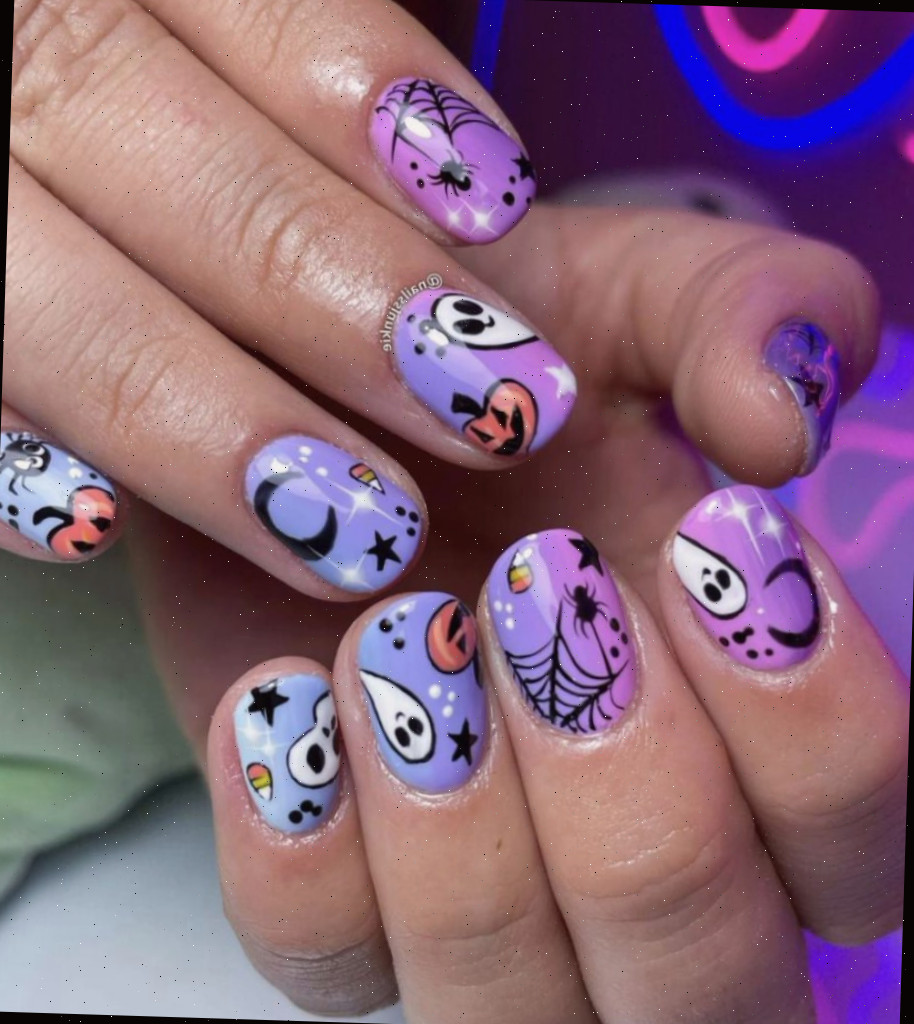 Unhas roxas com designs assustadores