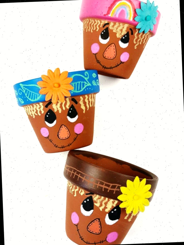 Exemplos de vasos de flores espantalho completos