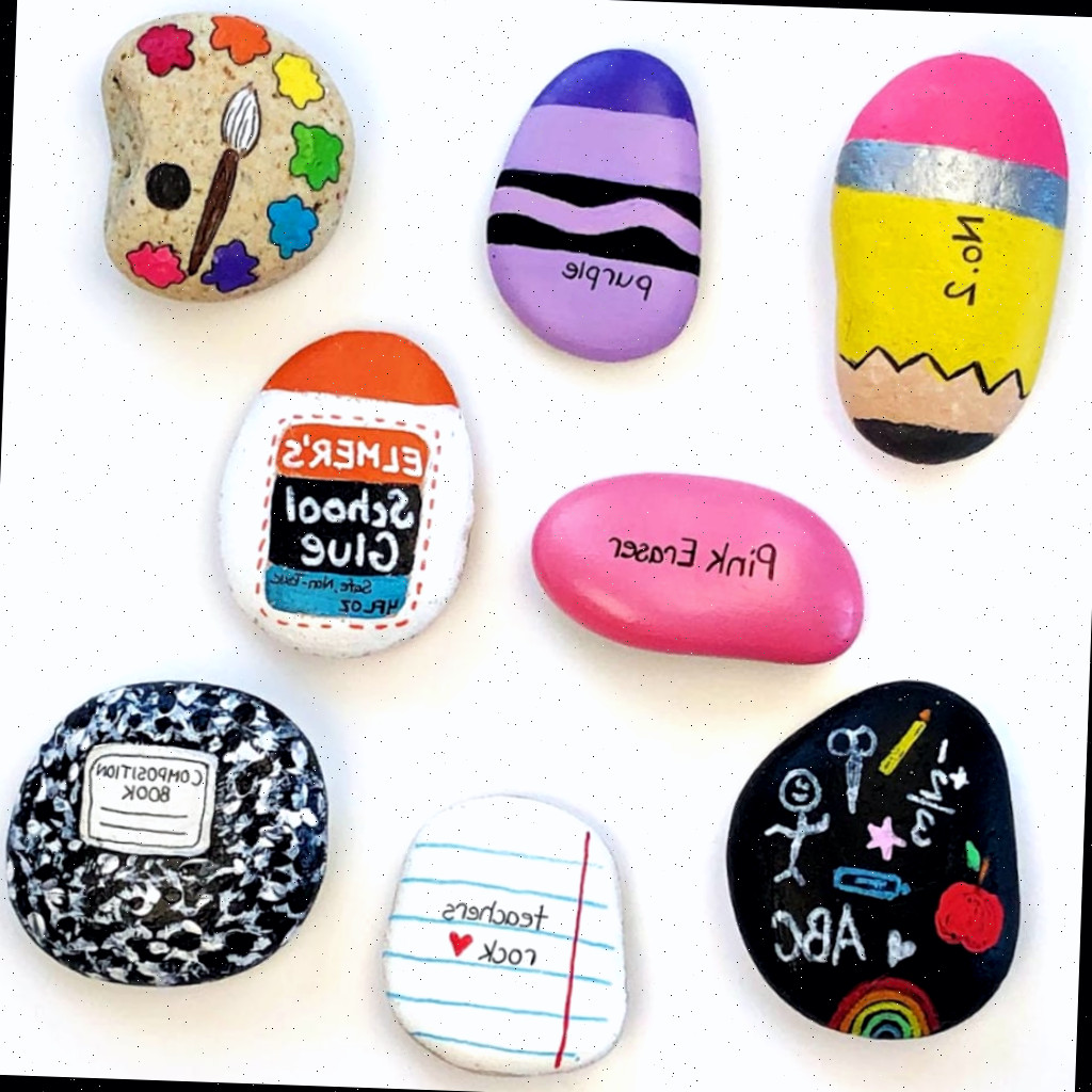 Pedras pintadas de materiais escolares para volta às aulas