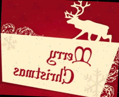Rena em cartão vermelho com as palavras Feliz Natal.