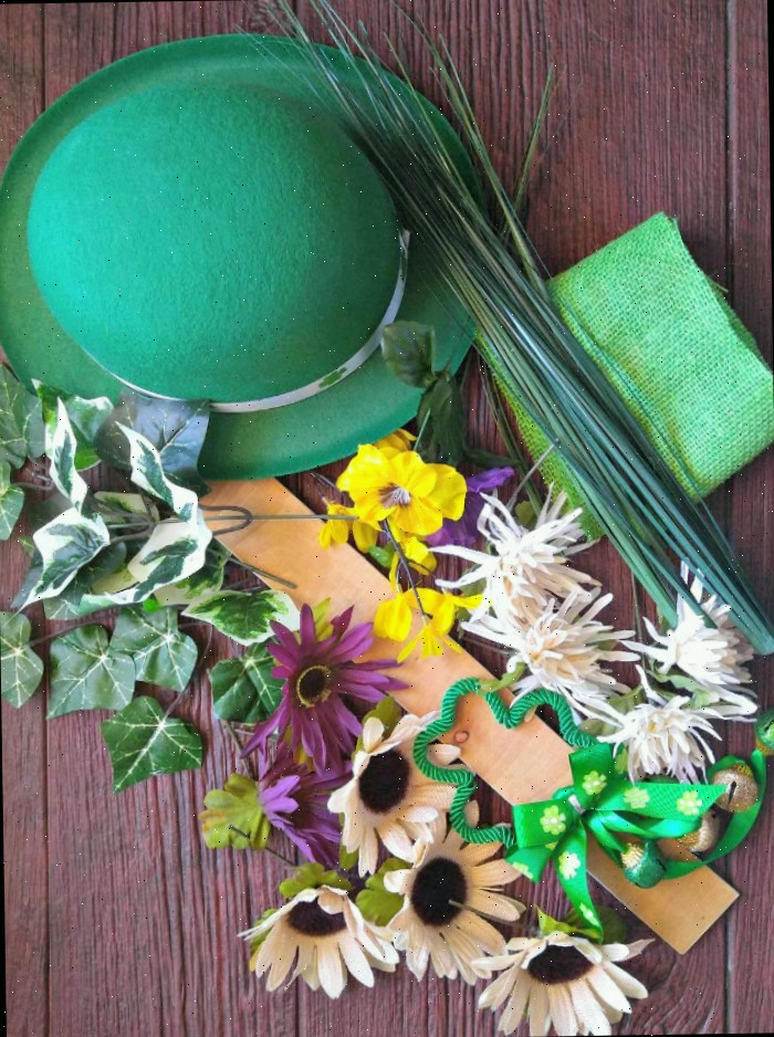 materiais para guirlanda de porta Chapéu de duende, flores, trevos, folhas e compensado.